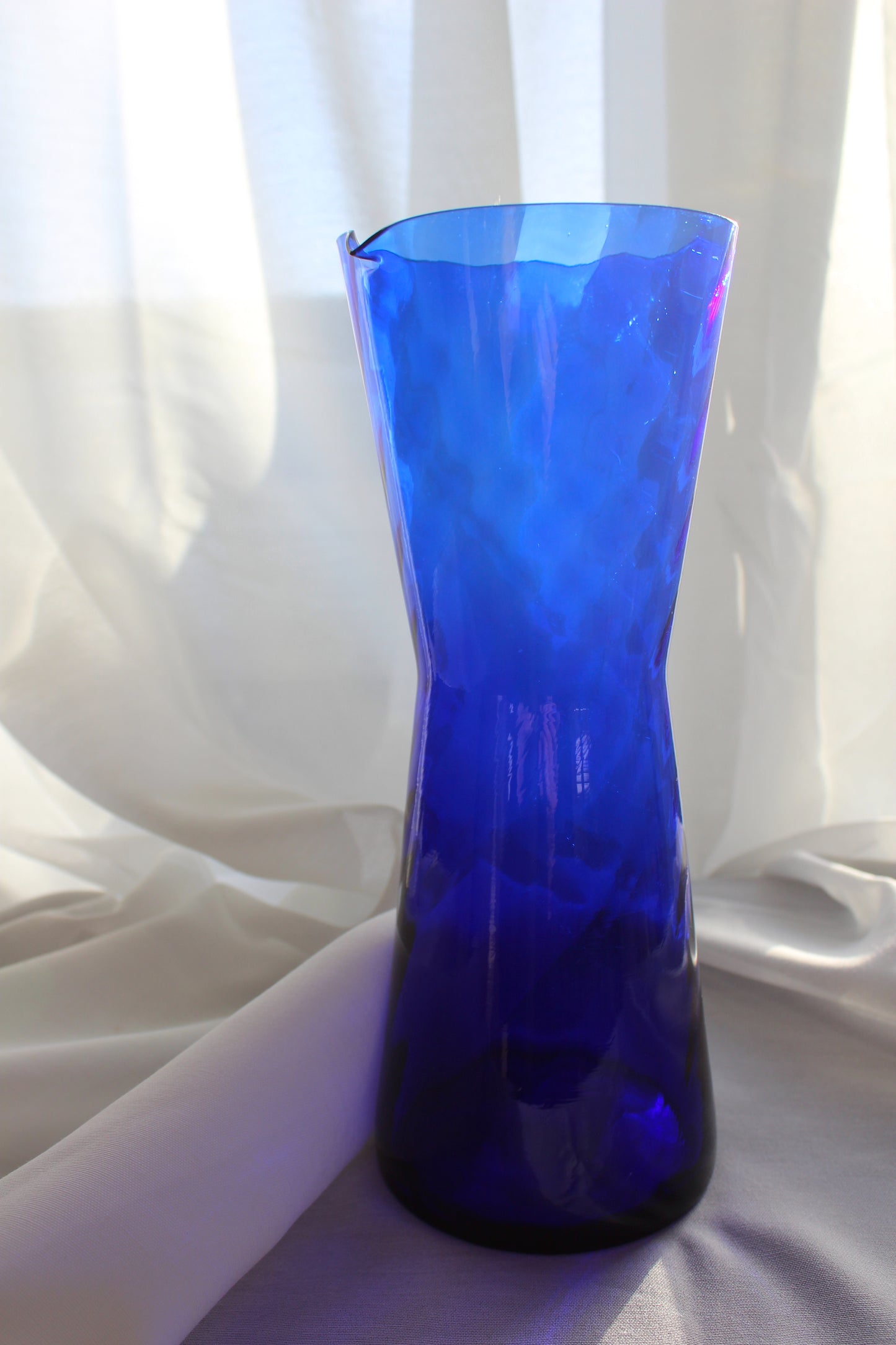 Blue glass jug