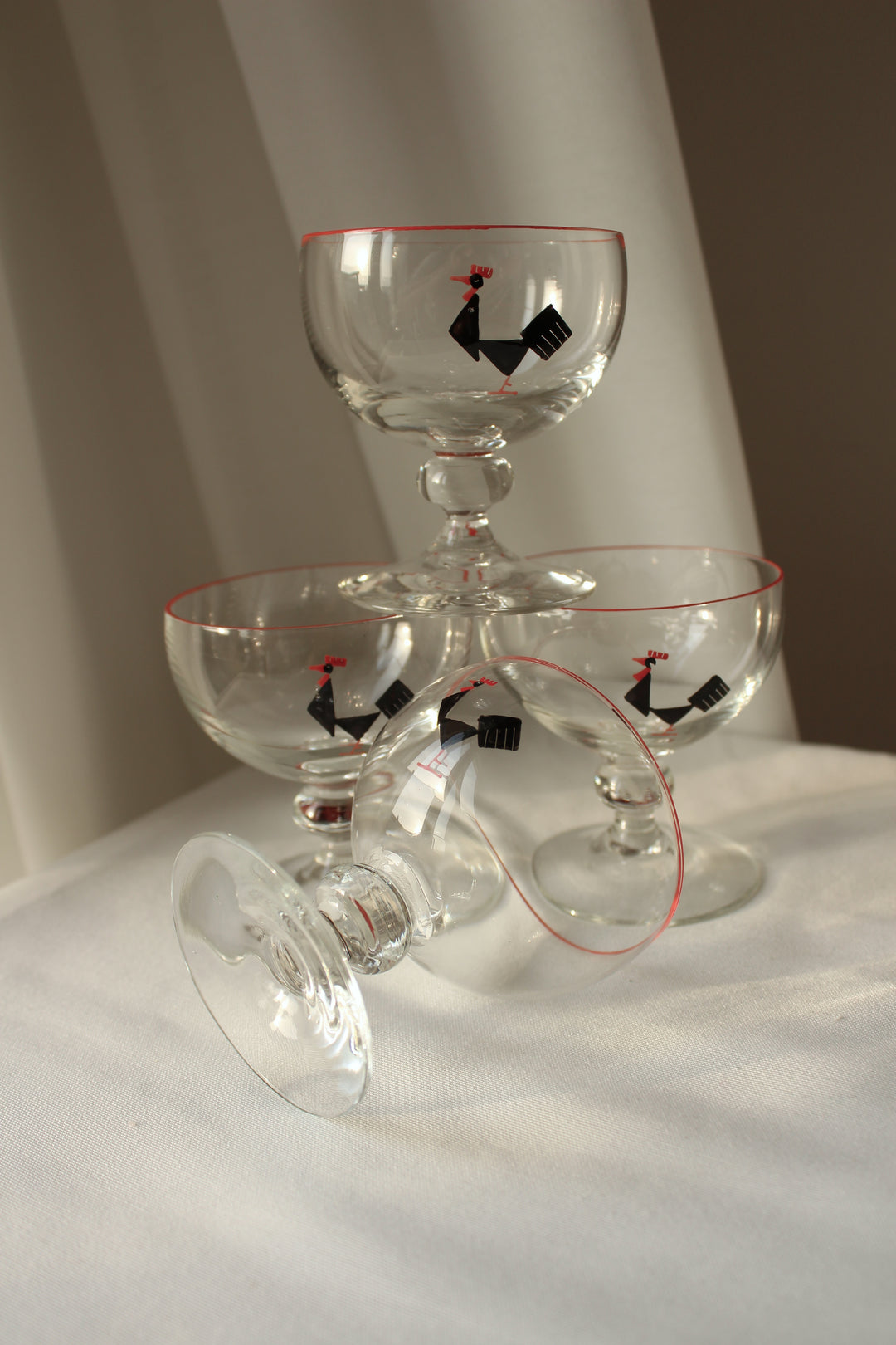 Holmegaard - Cocktail glass with enamel painted black tap, red rim.