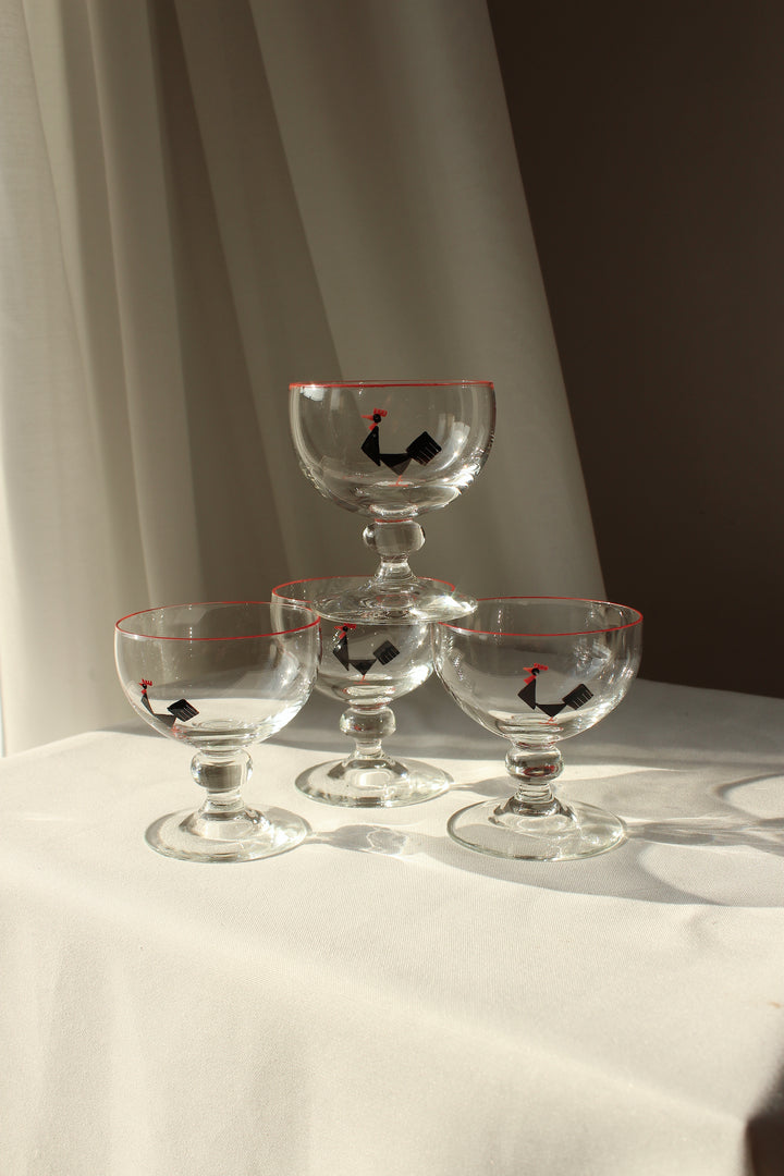 Holmegaard - Cocktail glass with enamel painted black tap, red rim.