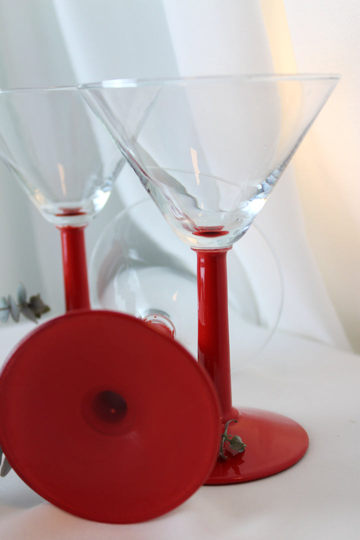 Cocktail glass with red stem