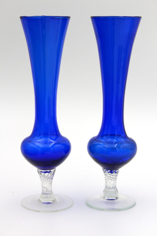 Blue vases with swirl feet